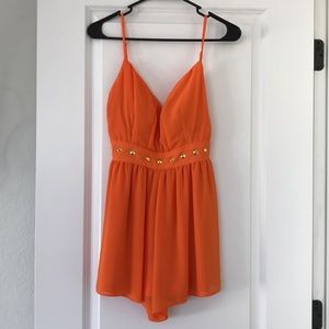 Cute orange romper with tags
